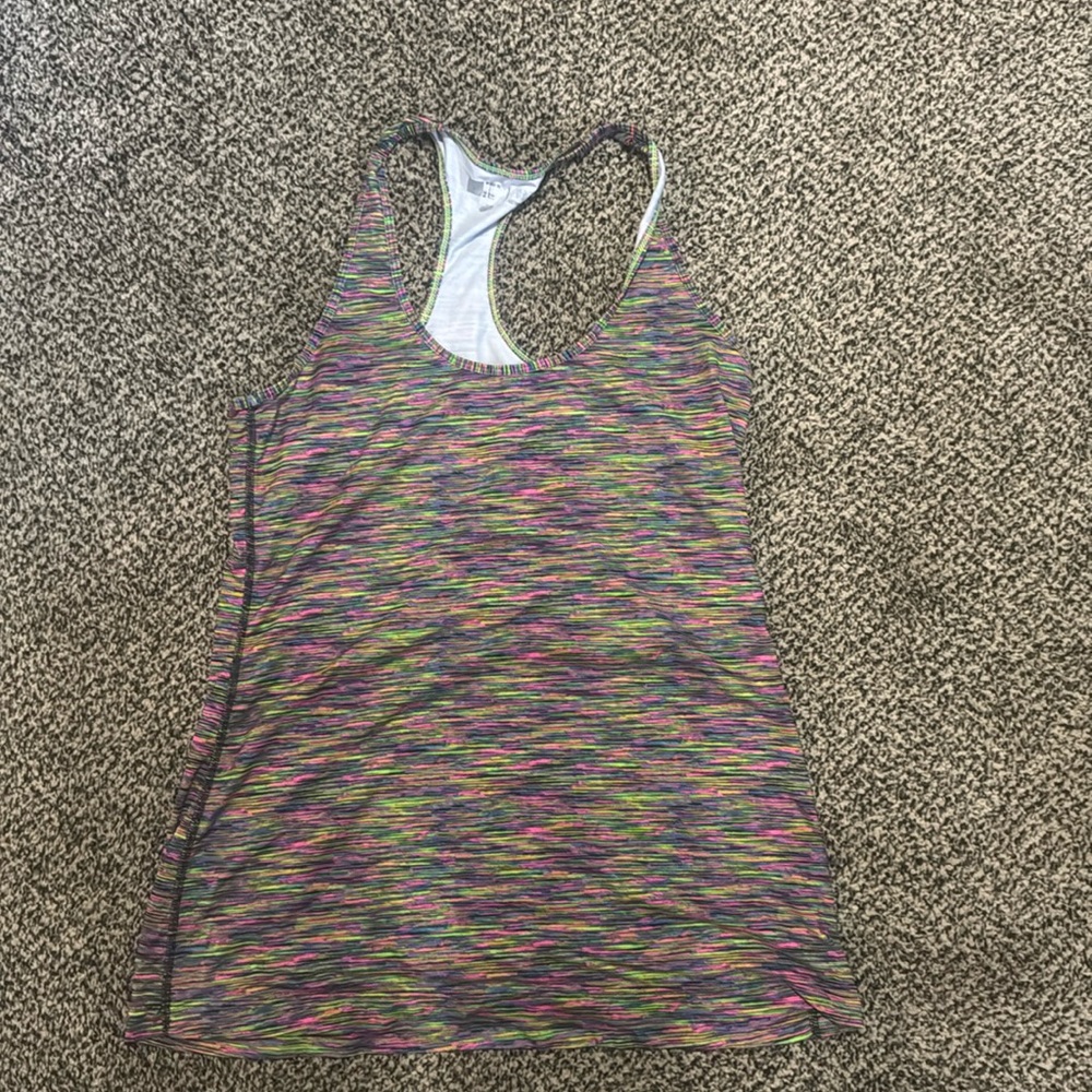 Multi color work out tank/tank in general. Large never worn smoke free home.